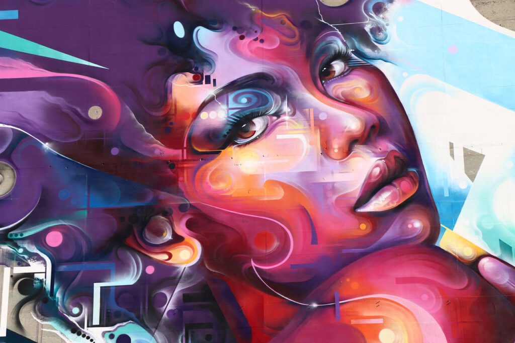 Ein Foto von eine Graffity Bild, welches eine Frau zeigt.